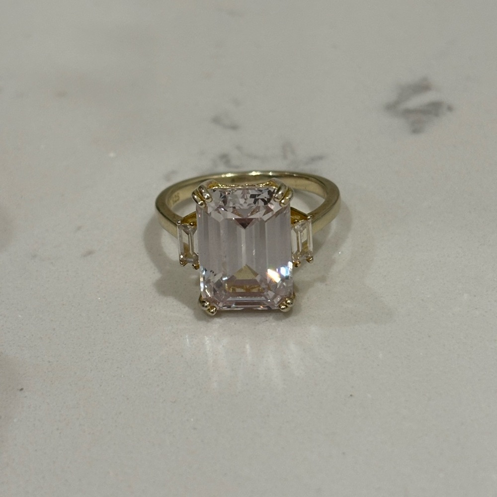 925 silver ring with emerald cut stone
